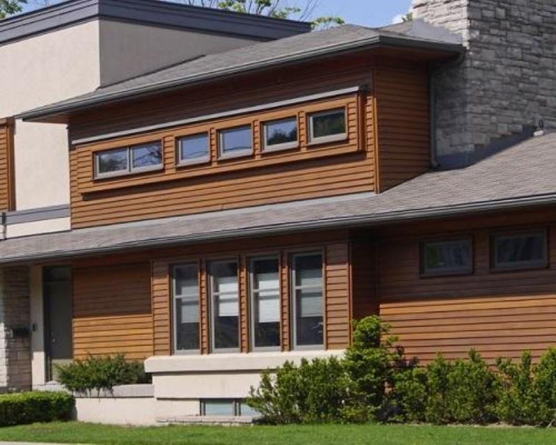 Peinture V33 extérieur climat extrême sur une façade de maison face à des éléments naturels intenses